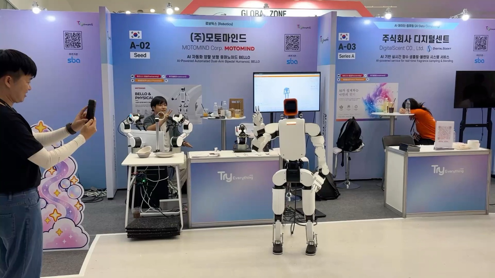 Exhibition booth demo — a 140 cm form factor that works beside people